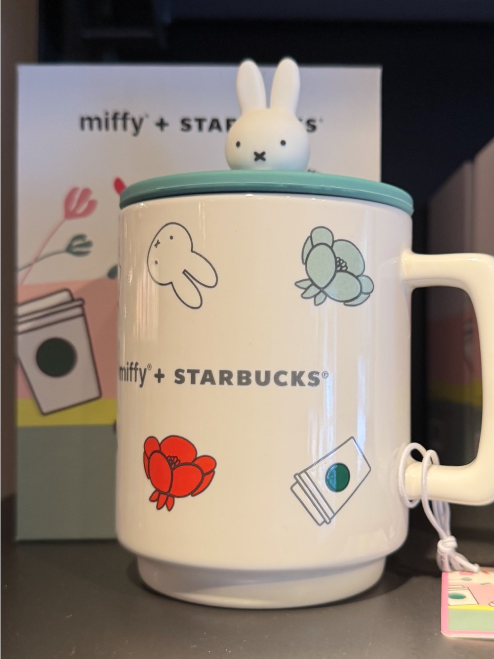 Starbucks White Ceramic Miffy Mug with Turquoise Lid and Red Floral Accents